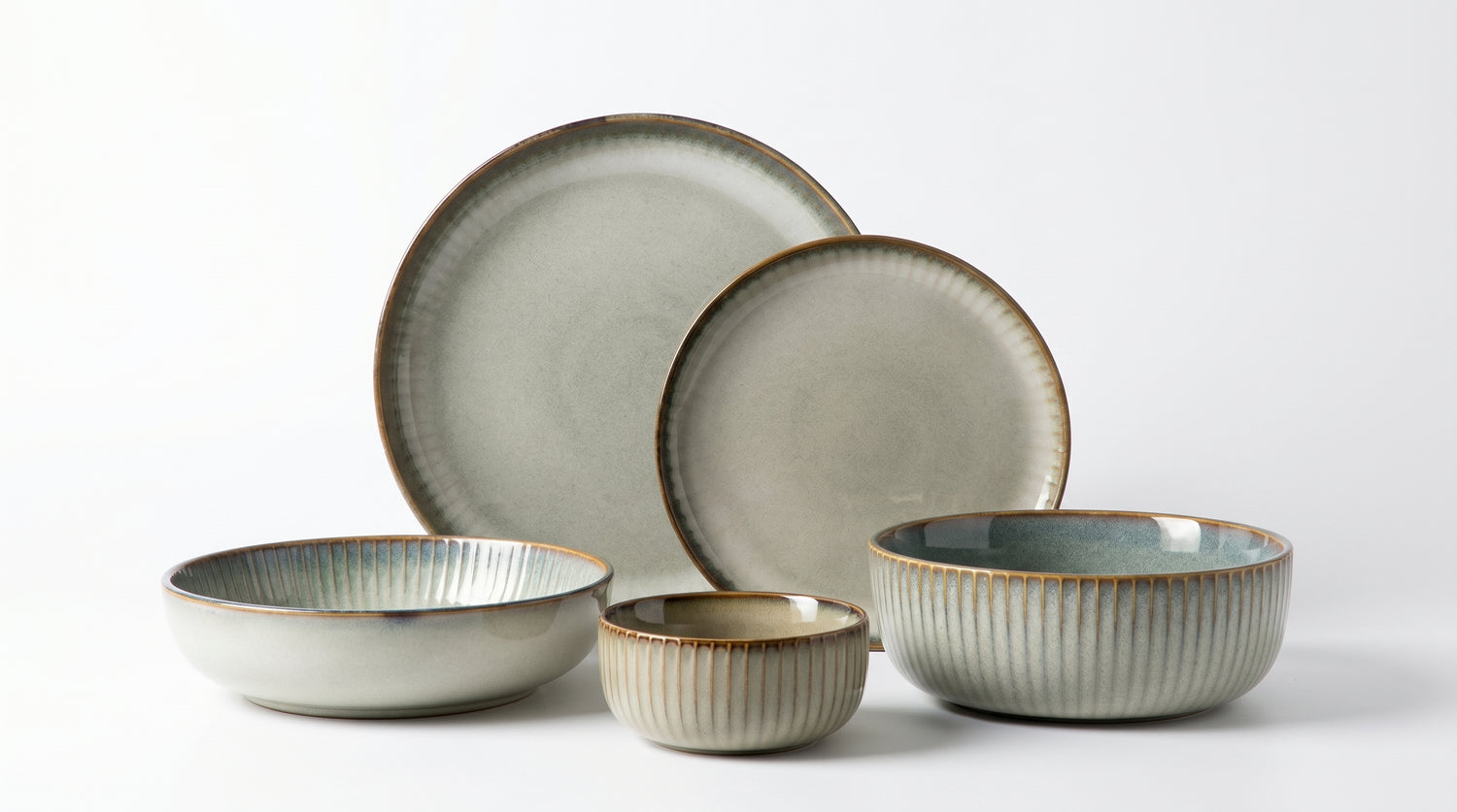 Set of ceramic bowls with a textured finish on a white background